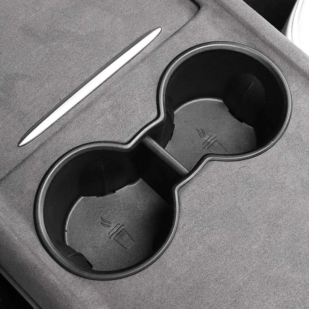 http://pimpmyev.com/cdn/shop/products/pimpmyev-car-accessories-non-slip-rubber-insert-for-cup-holders-for-model-y-2021-34576111763712.jpg?v=1636945051