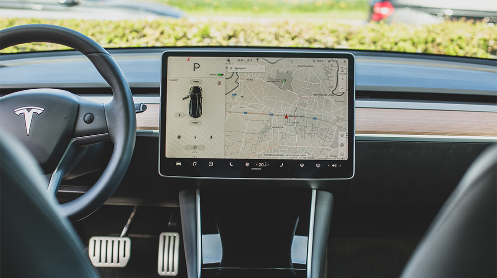 What's the difference between Tesla's Standard Connectivity and Premium Connectivity?