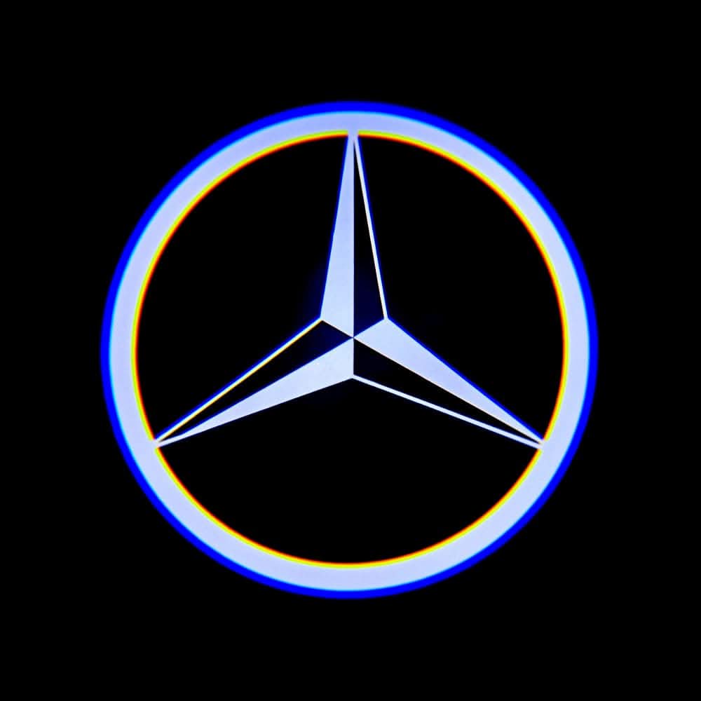 Mercedes-Benz logo with a rainbow gradient on a black background
