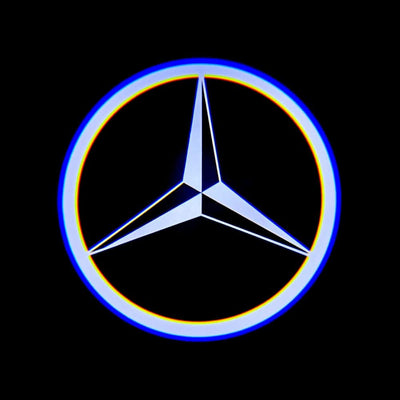 Mercedes-Benz logo with a rainbow gradient on a black background