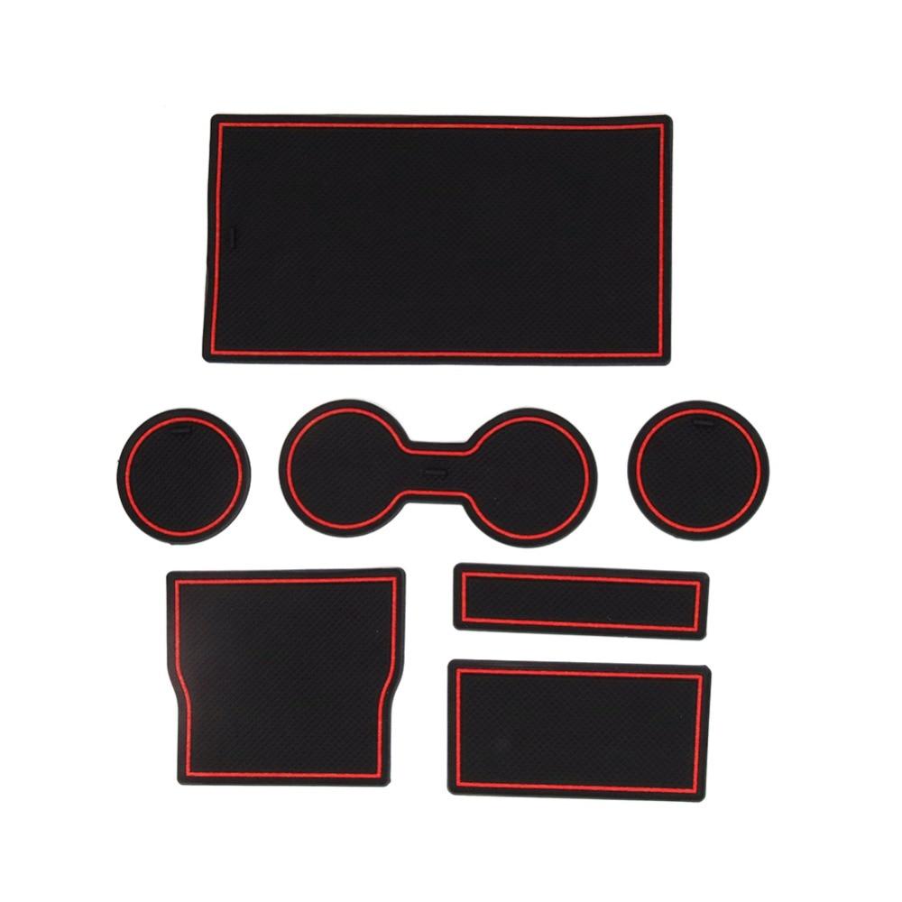 https://pimpmyev.com/cdn/shop/products/pimpmyev-car-accessories-black-with-red-outline-set-non-slip-rubber-mats-dashboard-and-cup-holders-for-model-3-14472656486455.jpg?v=1602250648