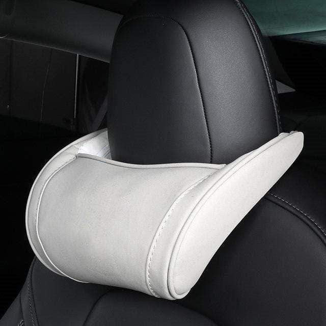 https://pimpmyev.com/cdn/shop/products/pimpmyev-seat-cushions-white-2pcs-neck-support-pillows-cushions-for-all-tesla-cars-29438881267909.jpg?v=1628078186